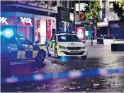  ?? ?? Above, police at the scene in Liverpool city centre where Ava White,