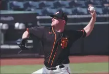  ?? CARMEN MANDATO — GETTY IMAGES ?? Jake McGee also pitched one hitless inning with one strikeout for the Giants in Thursday’s spring training game at Scottsdale, Arizona.