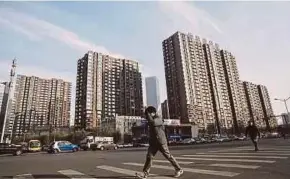  ?? BLOOMBERG PIC ?? Average new home prices in China’s 70 major cities rose 0.6 per cent last month, unchanged from the pace of growth in March, according to a monthly survey.