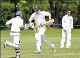  ??  ?? n SEALING VICTORY: Steve Gibson scored the winning runs
File