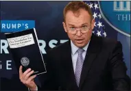  ?? OLIVIER DOULIERY/ABACA PRESS ?? President Donald Trump named Mick Mulvaney, who serves as head of the White House Office of Management and Budget, as interim director of the Consumer Financial Protection Bureau.