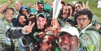  ?? Courtesy: DCC ?? Old Hawks team celebrate after lifting the Dubai Cricket Council’s Big 40 league trophy.