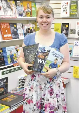  ??  ?? Rachael Baker from The Book Connection with some suggested summer reading, including ‘Fire and Blood’ by George R.R. Martin, ‘Winx the Authorised Biography’ by Andrew Rule, and ‘The Barefoot Investor for Families’ by Scott Pape. PHOTO: DUBBO PHOTO NEWS/SOPHIA ROUSE