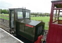  ?? ?? Motor-Rail Simplex 4wDM Major J.A. Robins R.E. on April 20 with the Heritage Railway Associatio­n award-winning former Nocton Estates Railway carriage Queen Mary at Walls Lane station. The football pitches, with the games being played, are in the background. CHRIS BATES/LCLR