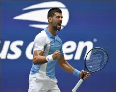  ?? AFP ?? Serbia’s Novak Djokovic celebrates a point against USA’s Taylor Fritz.