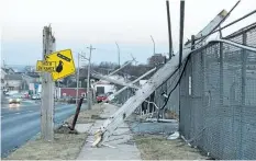  ?? ANDREW VAUGHAN/ THE CANADIAN PRESS ?? Damaged power lines are seen in Dartmouth, N. S., on Tuesday.