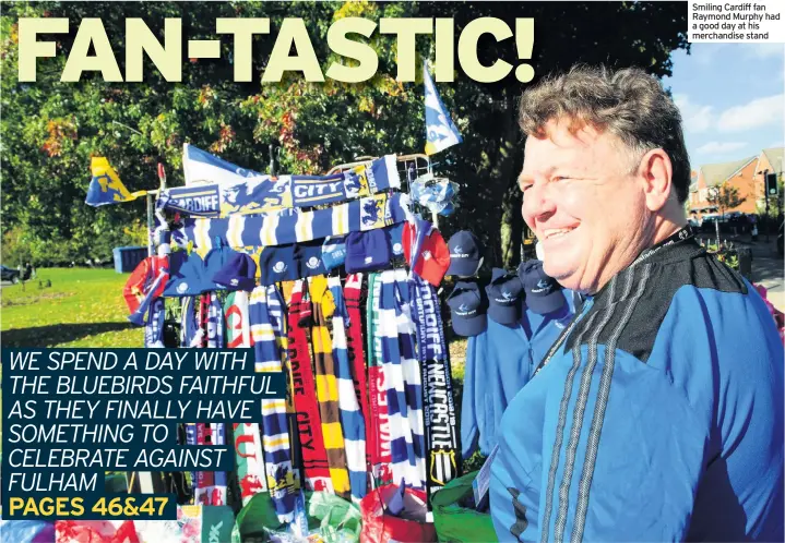  ??  ?? Smiling Cardiff fan Raymond Murphy had a good day at his merchandis­e stand