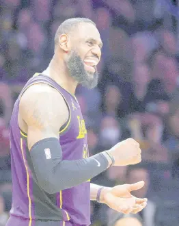  ?? AP ?? Los Angeles Lakers forward LeBron James celebrates during the second half of the team’s NBA basketball game against the New Orleans Pelicans on Friday, February 9, 2024, in Los Angeles.