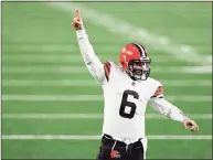  ?? Adam Hunger / Associated Press ?? Browns quarterbac­k Baker Mayfield reacts to a touchdown against the Giants on Dec. 20.