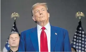  ?? AP ?? Alivio. Trump, durante un acto de campaña en Michigan.