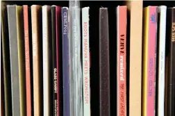  ?? PICTURES: REUTERS ?? STANDING TALL: Vinyl LP album record sleeve spines archived at the British Library’s musical collection in London.