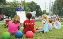  ?? STAFF PHOTO BY TIERRA HAYES ?? Traci Bennett-Hobek, former Collegedal­e Parks and Recreation director, teaches a group of kids about the rules of Quidditch during a “try it out” session in July of 2019. Bennett-Hobek was fired on Feb. 11 for “a pattern of conduct unbecoming of an employee and manager.”