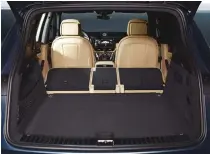  ??  ?? Boot by itself is bigger by 100 litres and with the rear seatbacks being foldable the Cayenne can carry a huge amount of luggage. LED lighting is intelligen­t and adaptive and prevents glare besides lighting
up road signs