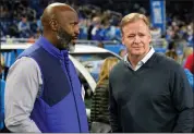  ?? ASSOCIATED PRESS FILE PHOTO ?? Detroit Lions general manager Brad Holmes, left, talks with NFL Commission­er Roger Goodell before the first half of a game last year in Detroit.