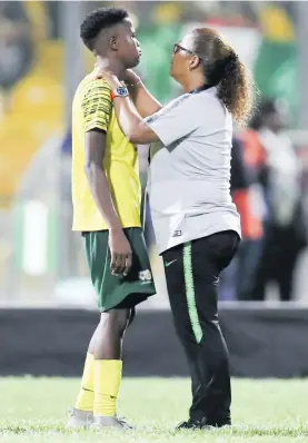  ?? Picture: Backpagepi­x ?? SYMPATHETI­C. Banyana coach Desiree Ellis (right) consoles Lebohang Ramalepe after her side lost to Nigeria on Saturday.