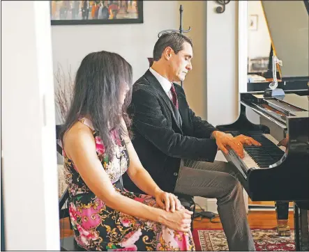  ??  ?? Shenton and Shields have led online concerts from their living room to raise thousands of dollars for the Mosaic West Queens Church food pantry.