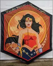  ??  ?? This Wonder Woman kite is one example of the many different kinds of kites that will be auctioned online through the month of February at KitesFight­ingCancer.com.