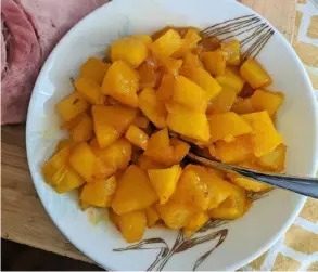  ??  ?? Fresh pineapple is cooked down with honey, vinegar, brown sugar and curry powder to make a bold and spicy chutney for Easter ham.