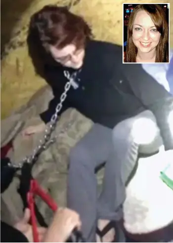  ??  ?? Chained: An officer uses bolt cutters to free Kala Brown, inset, in the container