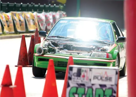  ?? Photo by Jean Nicole Cortes ?? HOMECOURT. Racing phenom Iñigo Anton negotiates the course of the 2018 Phoenix National Front Wheel Drive (FWD) Slalom championsh­ip during his hometown race held last weekend at the Baguio Athletic Bowl.