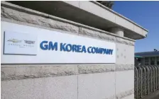  ?? — Reuters ?? The main gate to GM Korea’s Gunsan factory is seen in Gunsan.