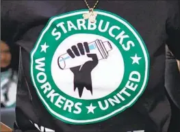  ?? J. Scott Applewhite Associated Press ?? STARBUCKS WORKERS UNITED “prepared thoroughly for its organizing efforts ... and was effective at leveraging Starbucks’ early missteps,” a report said.