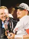  ?? REED HOFFMANN/AP ?? Chiefs quarterbac­k Patrick Mahomes holds the Lamar Hunt Trophy after they defeated the Bengals in the AFC championsh­ip game Sunday.
