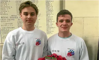  ?? ED SCRAGG/ STUFF ?? Connor Sherry, left, with Zak Blackburn, laid a wreath for great-grandfathe­r Charles Beddow at the Menin Gate after discoverin­g on his trip to Flanders where he had died.