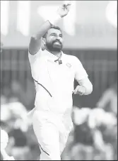  ??  ?? Mohammed Shami celebrates taking one of his four wickets. (BCCI photo)