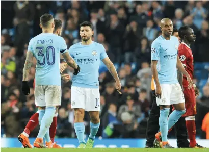 ?? AP ?? Manchester City’s players after the loss against Liverpool during the Champions League quarterfin­al at Etihad Stadium. —