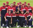  ?? AP ?? The US team with the ■ Ryder Cup trophy at the Whistling Straits Golf Course on Sunday.