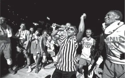  ??  ?? Rapper iHeartMemp­his performs with the Tiger basketball team during Memphis Madness at the FedExForum Wednesday, Oct. 12, 2017. MARK WEBER/THE COMMERCIAL APPEAL