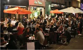  ?? Photograph: Dominic LiRishi ?? People enjoying a night out in Soho in London; the closure of bars and restaurant­s at 10pm in the capital is one of the measures being contemplat­ed.