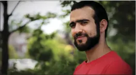  ?? COLIN PERKEL/THE CANADIAN PRESS VIA AP ?? Former Guantanamo Bay prisoner Omar Khadr, 30, is seen in Mississaug­a, Ont., on Thursday. The federal government has paid Khadr $10.5 million and apologized to him for violating his rights during his long ordeal after capture by American forces in...
