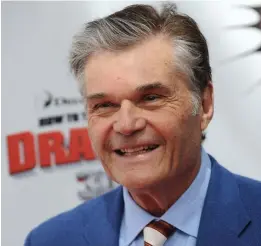  ?? GETTY IMAGES FILE ?? KEPT PEOPLE LAUGHING: Comedic actor Fred Willard arrives for the premiere of DreamWorks’ ‘How To Train Your Dragon’ in Universal City, Calif., in 2010. Willard, 86, died Friday of natural causes.