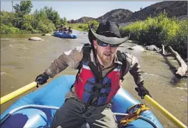  ?? Rick Loomis Los Angeles Times ?? JASON LAIRD paddles down the Santa Ana River in Corona in September 2014. California has the most complex water resources system in the world.