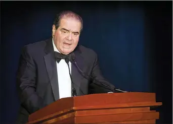  ?? KEVIN WOLF — THE ASSOCIATED PRESS FILE ?? In this Nov. 6, 2014, file photo Supreme Court Justice Antonin Scalia speaks in Washington.