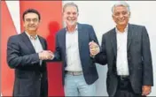  ?? PTI ?? From left: Sandeep Kataria, director, commercial, Vodafone India; Reed Hastings, cofounder and CEO, Netflix; Himanshu Patil, COO, Videocon d2h Ltd, in New Delhi on Monday