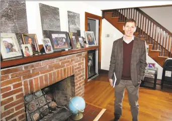  ?? Christian Abraham / Hearst Connecticu­t Media ?? Author Lewis J. Beilman III at his home in Hamden.