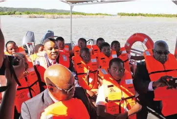  ?? Picture: GCINA NDWALANE ?? NEW FERRY: For years, the children in these parts have had to brave the crocodile- and hippo-infested waters of Lake Kosi Bay to get to and from school, and the new ferry is a welcome aid.