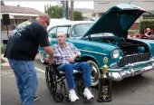  ?? RECORDER PHOTO BY CHIEKO HARA ?? Jim Mcdaniel, left, congratula­tes Loyd Winner, who won Monsignor Scott's Choice award Satruday at the 8th annual Parish Pride Car Show Downtown Portervill­e. Winner owns '45 Chevy Bel Air.