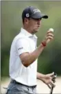  ?? ERIC GAY — THE ASSOCIATED PRESS ?? Justin Thomas waves to the gallery on the 15th tee during round five at the Dell Technologi­es Match Play golf tournament Saturday in Austin, Texas.