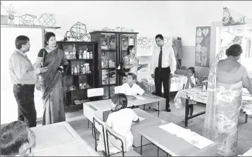  ??  ?? Seen here GSK Pharmaceut­icals Managing Director Stuart Chapman (far right) visits the model inclusive school assisted under the project.