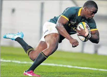  ?? Picture: STEVE HAAG, GALLO IMAGES ?? OLD HAND: Springbok Lwazi Mvovo displays his speed with the ball during the Test between SA and Scotland at the Nelson Mandela Bay Stadium, in Port Elizabeth, on Saturday. The Boks trounced the Scots with a 55-6 victory.