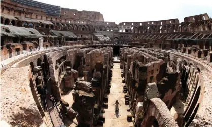  ?? Photograph: Franco Origlia/Getty Images ?? The hypogeum network lies beneath what was the amphitheat­re’s arena and was invisible to spectators in ancient times.