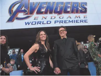  ?? AP PHOTO ?? Susan Downey and Robert Downey Jr. arrive at the premiere of Avengers: Endgame at the Los Angeles Convention Center on Monday.