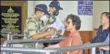  ?? PTI ?? Security personnel wear masks at Biju Patnaik Internatio­nal Airport in Bhubaneswa­r on Thursday.