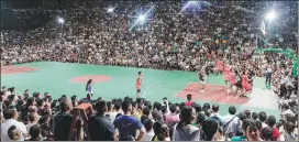 ?? ZHANG KUI / FOR CHINA DAILY ?? Locals throng around the court to watch the village-level basketball tournament in Taipan, Guizhou province. Some spectators even travel from as far away as provincial capital Guiyang, which is a 200-kilometer journey.