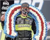  ?? GETTY IMAGES ?? Ryan Blaney, driver of the No. 12 Ford, celebrates after winning the NASCAR Cup GEICO 500 at Talladega Superspeed­way on Monday.