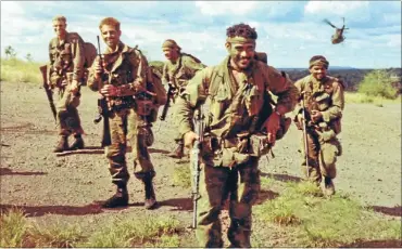  ??  ?? Diligent research: Coming home: SAS troopers Jack Hayes, of Masterton, Greg Sutherland, Jack Powley, Kere Tehana and Sammy Maaka returning to Landing Zone Nadzab from a seven-day patrol during their Vietnam deployment.